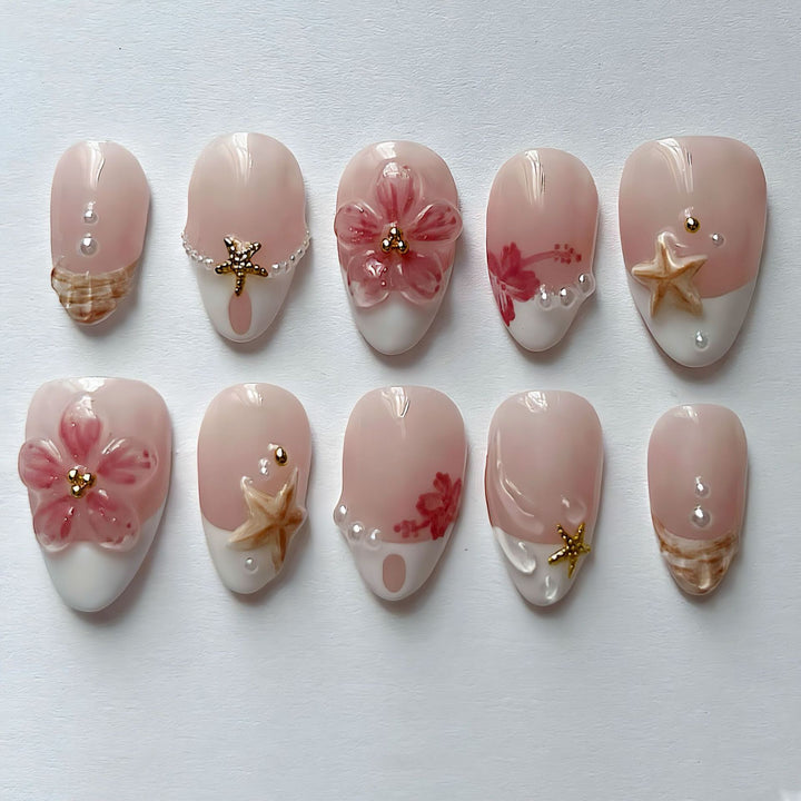Elegant artificial nails with floral designs and glitter accents Kalsten