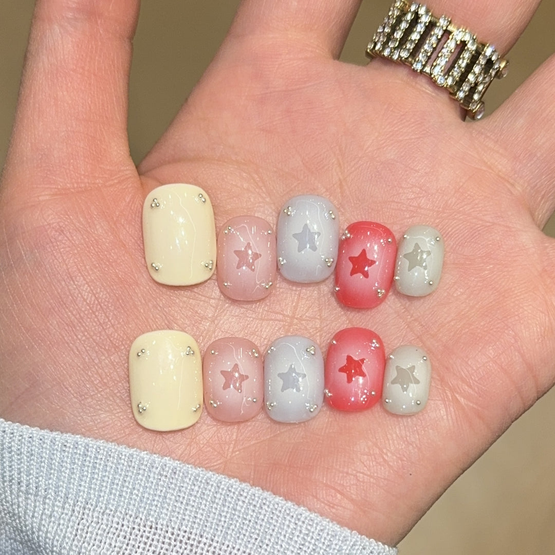 Artificial nails with sparkling star motifs Kalsten