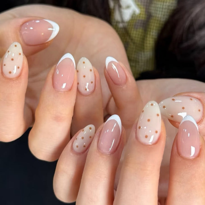 Elegant nail art with modern dots and French tips Kalsten