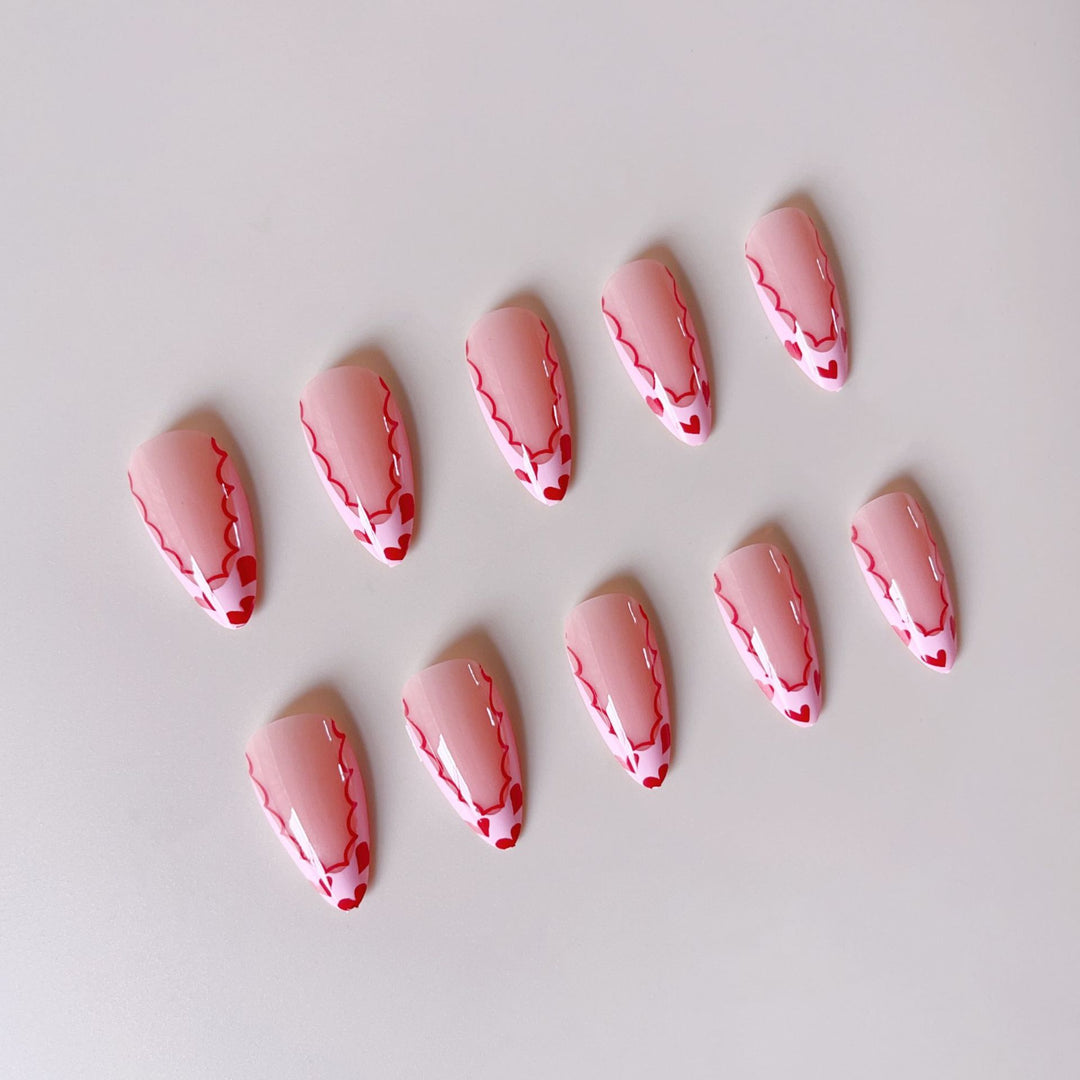 Acrylic nail set with elegant heart tips and creative accents Kalsten