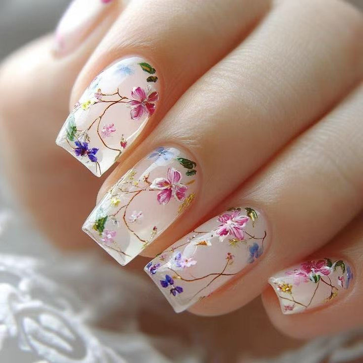 Nail set with floral accents and transparent shine Kalsten