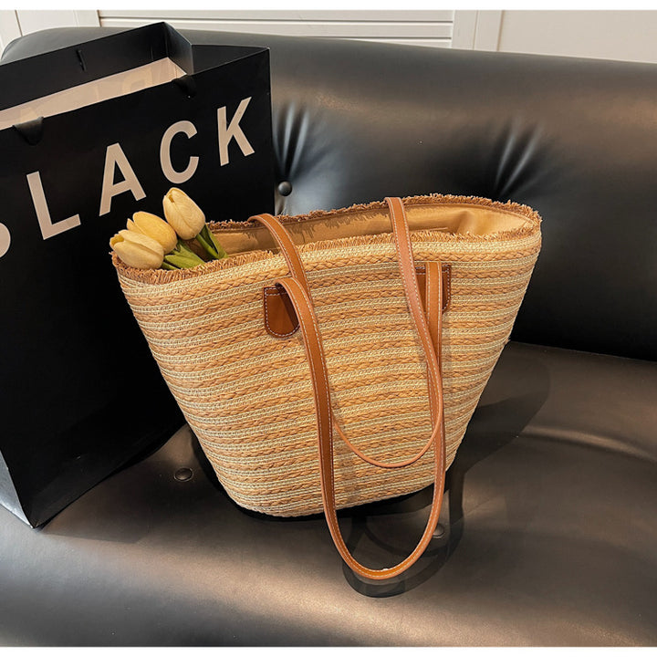 Generous beach bag with leather handles Kalsten