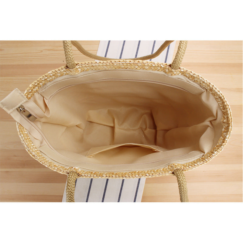 Shoulder bag made of braided natural material with long shoulder straps Kalsten
