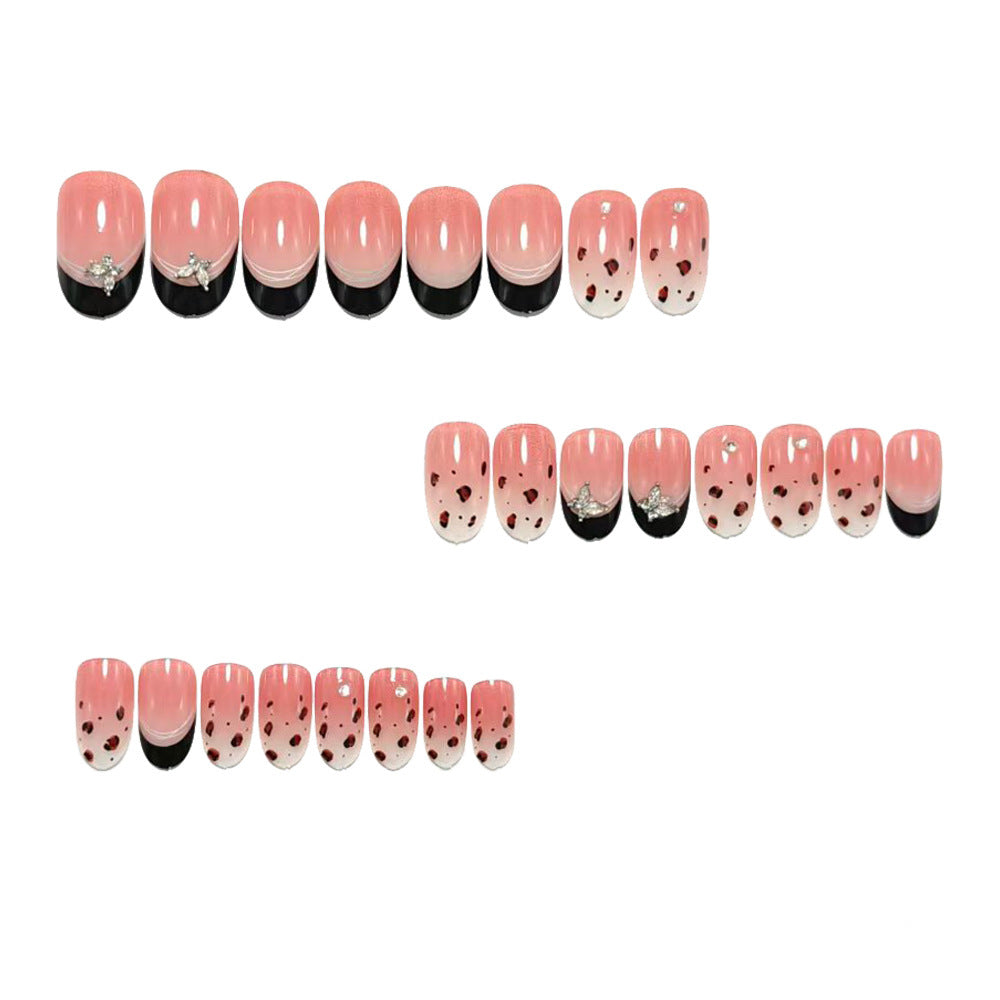Artificial nails in a modern style with elegant embellishments Kalsten