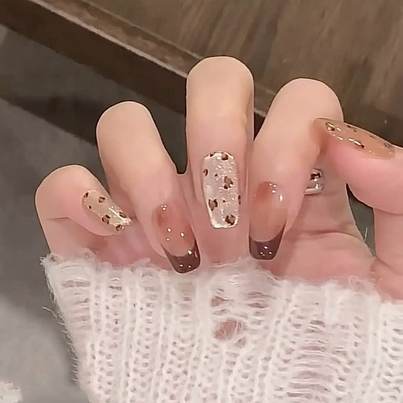 Artistic nail extensions with elegant glitter design Kalsten