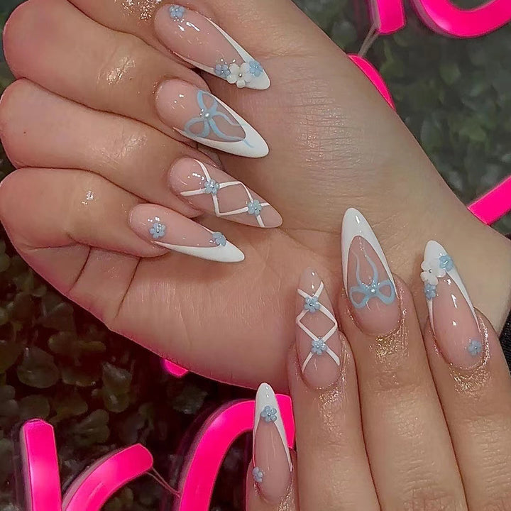 Acrylic nail set with elegant 3D flowers and glamorous accents Kalsten