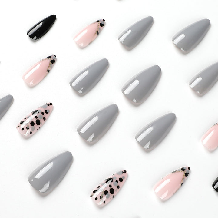 Artful stiletto nails with elegant accent design Kalsten