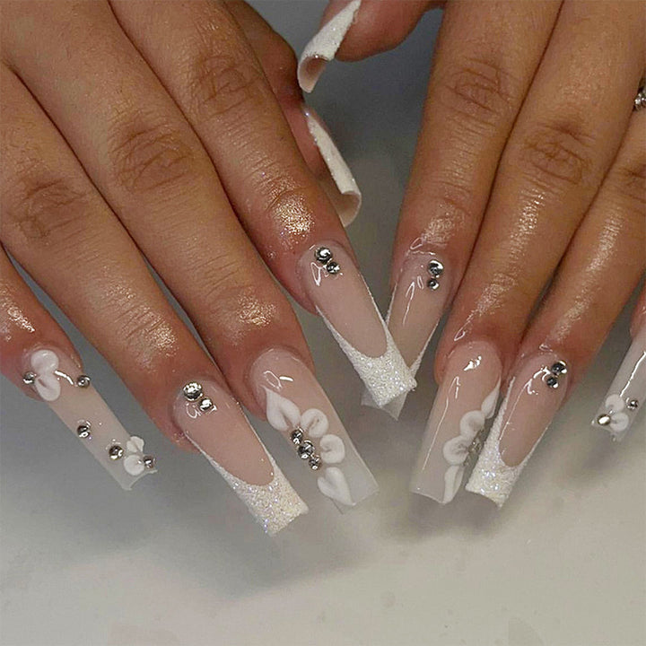 Glamorous stiletto artificial nails with floral details Kalsten