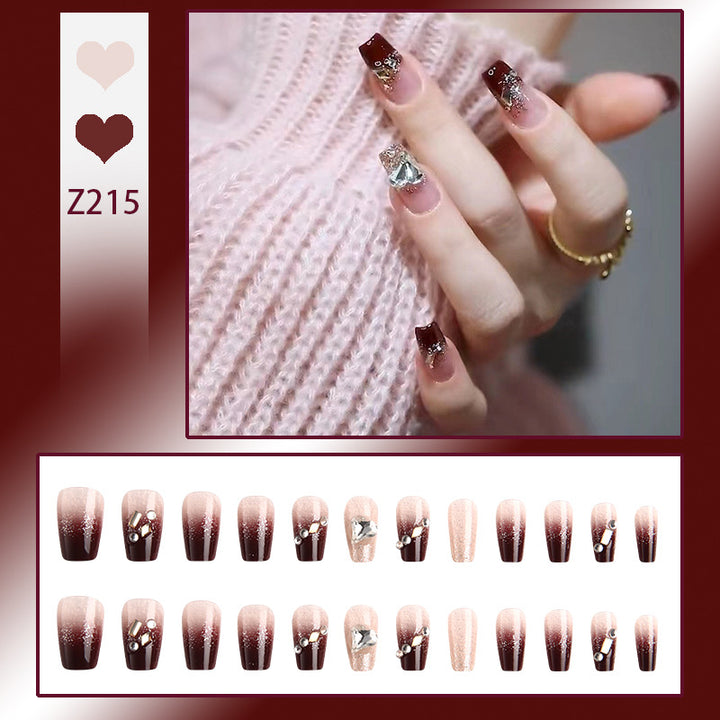 Artificials nails with glitter embellishments and elegant accents Kalsten