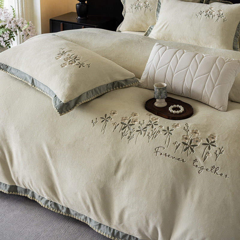 Premium cotton satin bed linen set with floral relief embroidery and satin trim