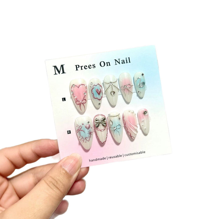 Artistic Press-On Nail Art Set with Heart and Bow Designs