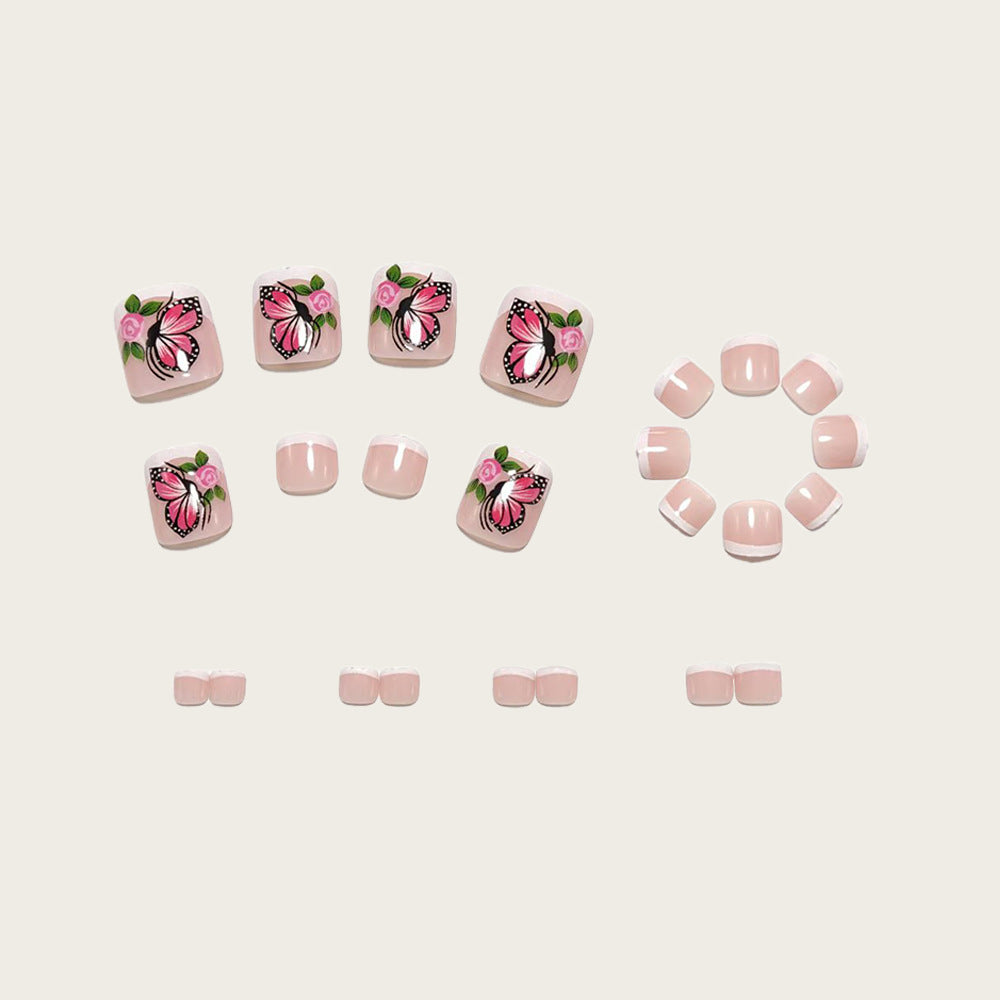 Artistic toenails with butterfly and rose designs Kalsten
