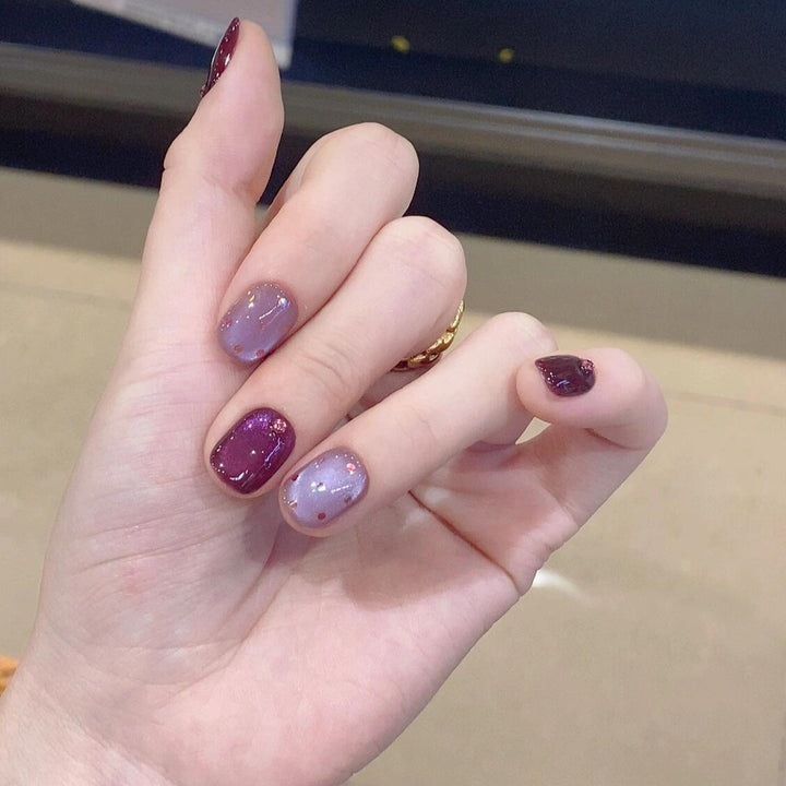 Artificial nails with unique glitter accents Kalsten