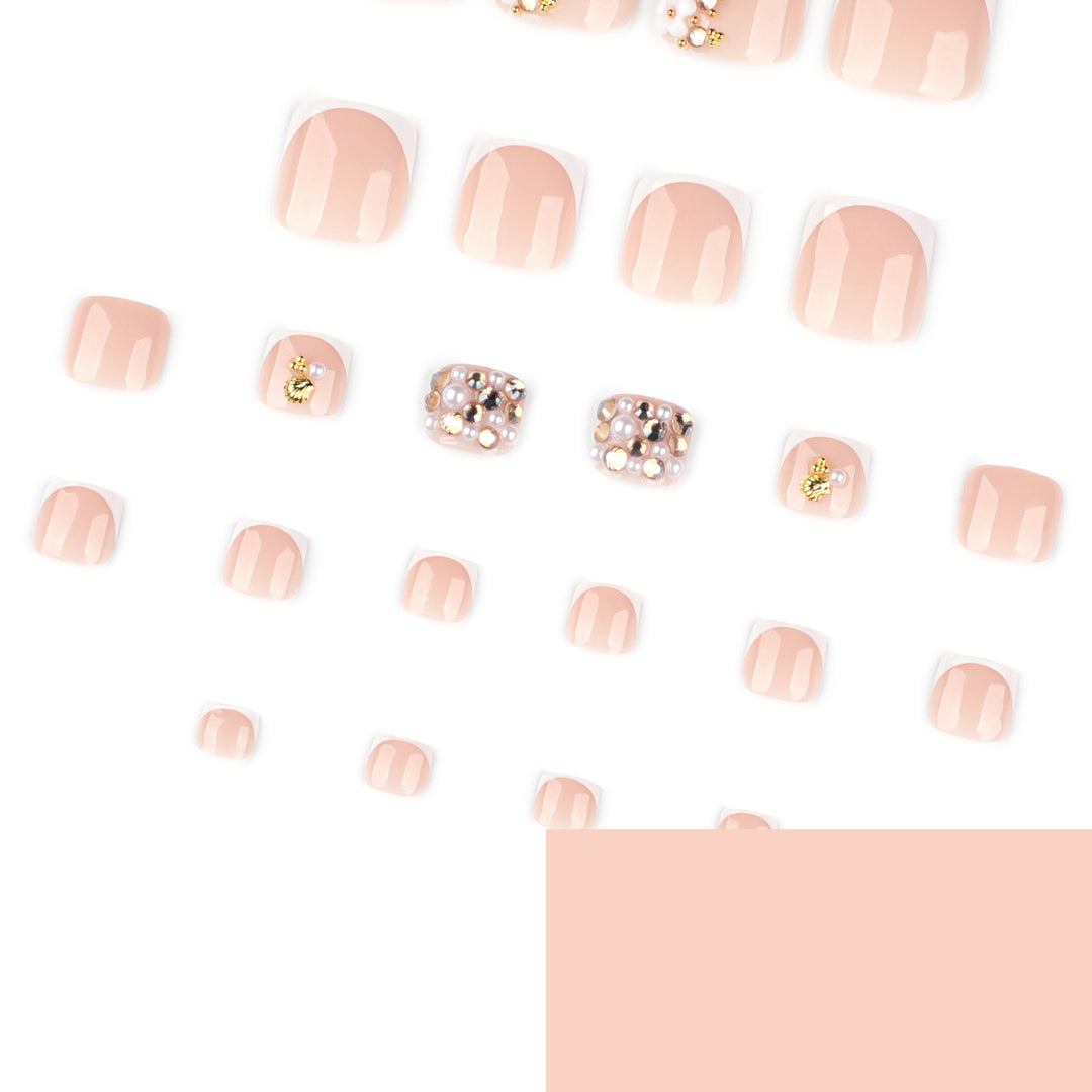 Glamorous toenail art with luxurious rhinestone and floral designs Kalsten
