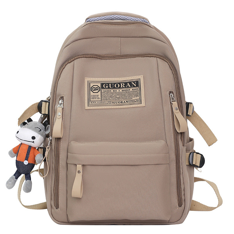 Versatile Casual Backpack with Plush Keychain