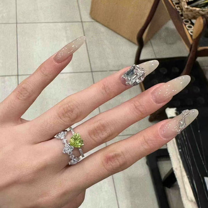 Elegant Stiletto Nail Extensions with Rhinestone Accents Kalsten