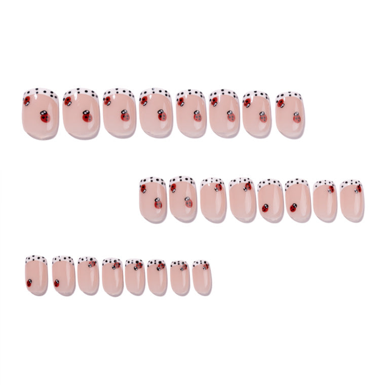 Artistic nail art with ladybug designs Kalsten