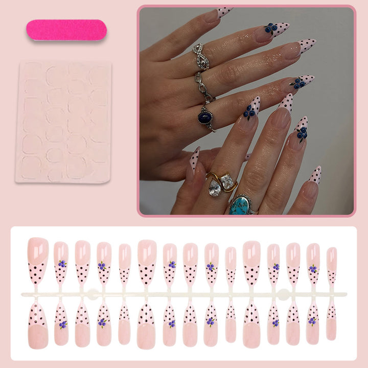 Acrylic nail set with stylish dots and floral embellishments Kalsten