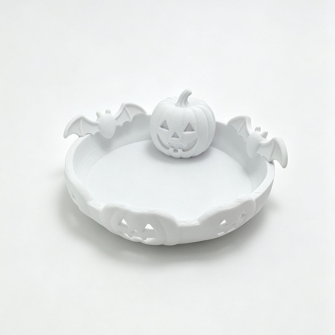 Halloween decorative bowl with carved pumpkin and bat appliqué