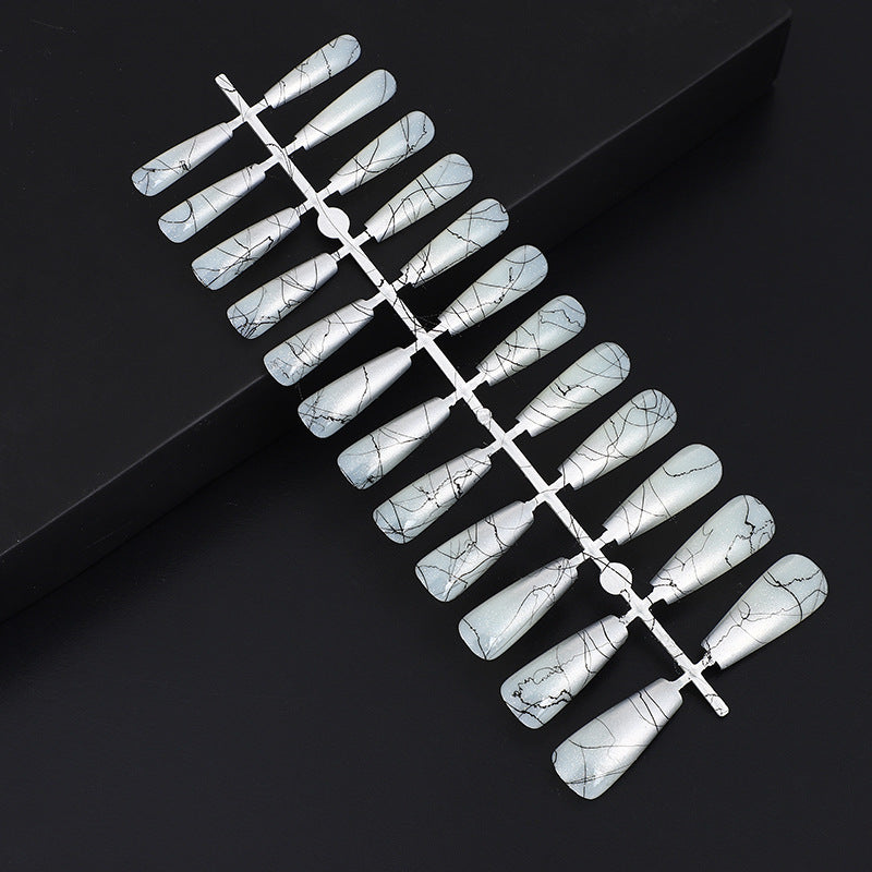 Artificial nails in modern ombre design with marbled accents Kalsten