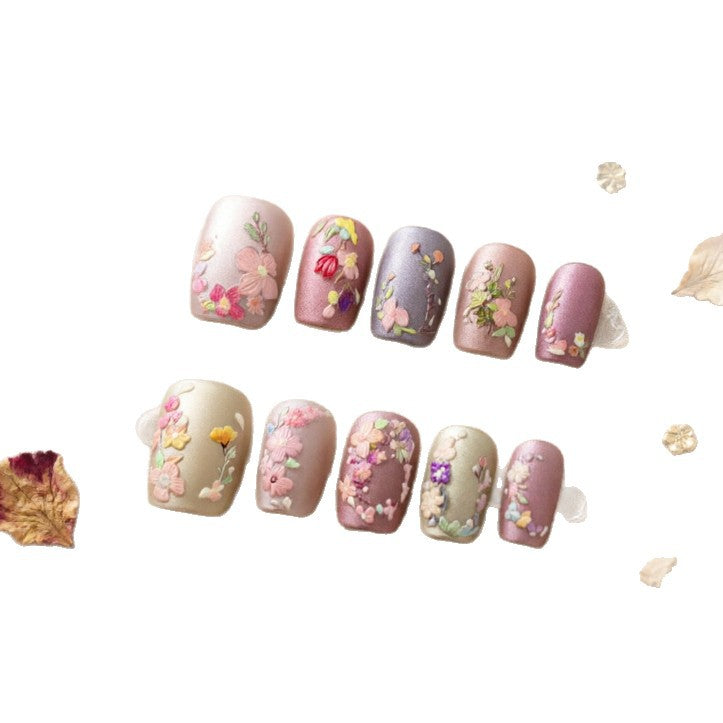 Art nail design with floral motifs Kalsten