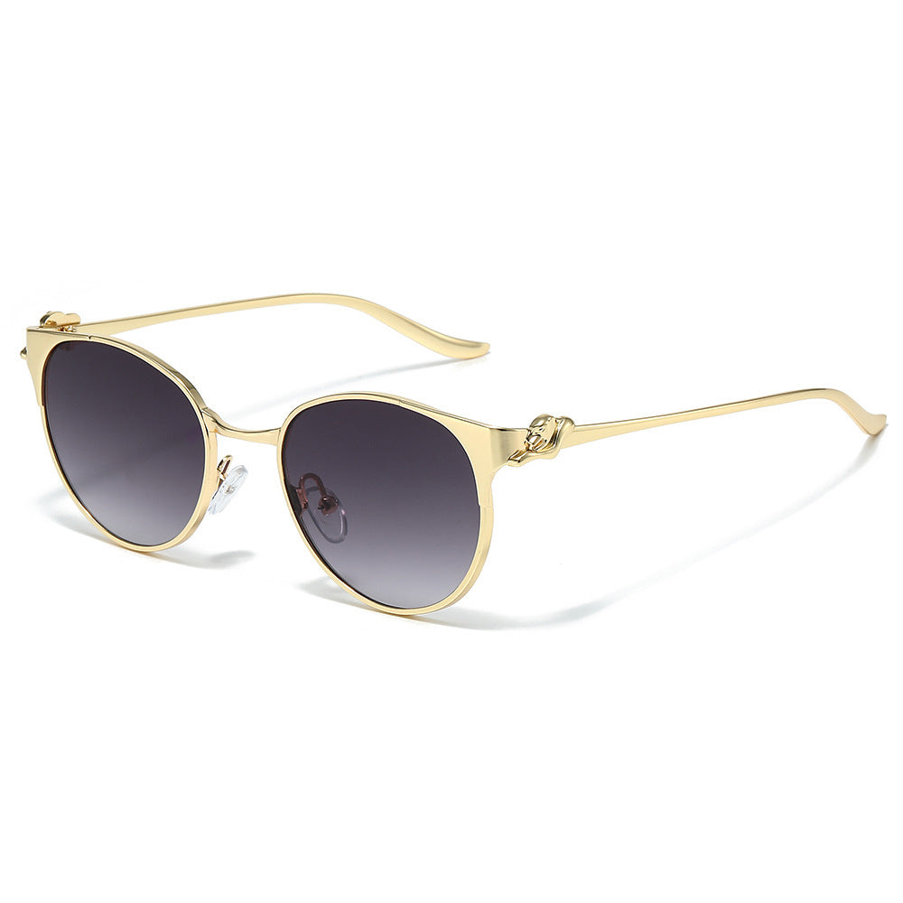 Elegant Cat-Eye Sunglasses with Decorative Gold Accents Kalsten