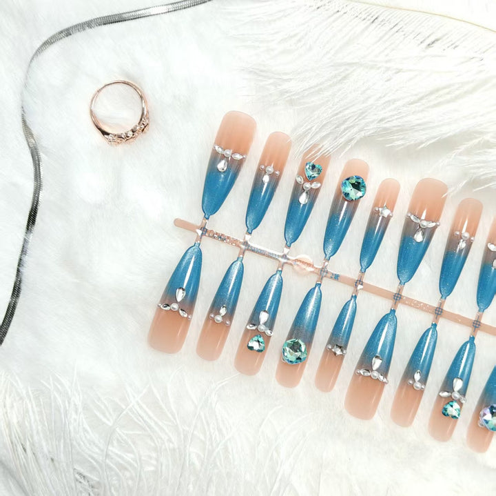 Glamorous artificial nails with sparkling rhinestone elements Kalsten