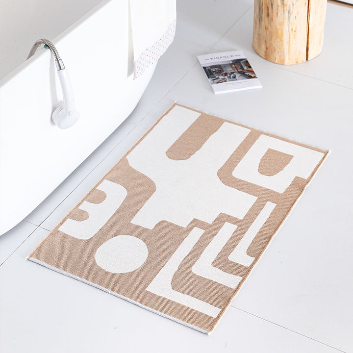 Flat-woven bath mat with abstract geometric pattern Kalsten