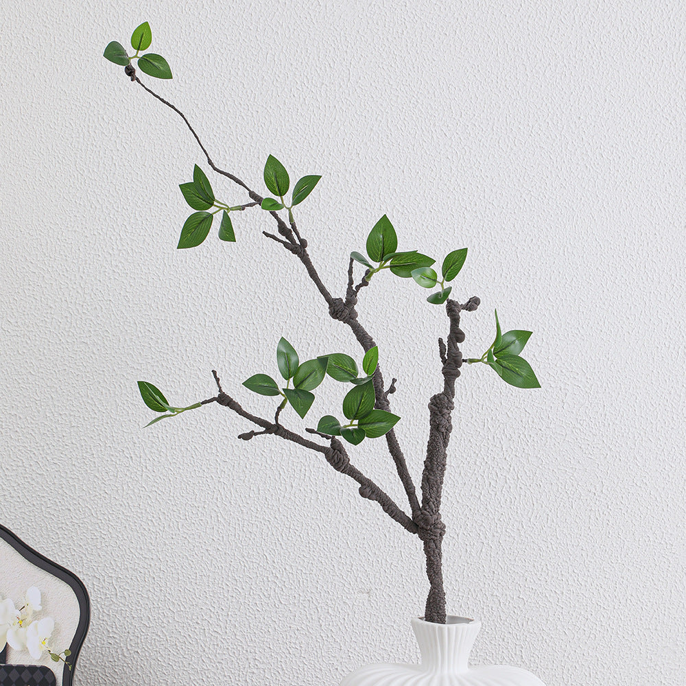 Decorative artificial tree branch with realistic leaves