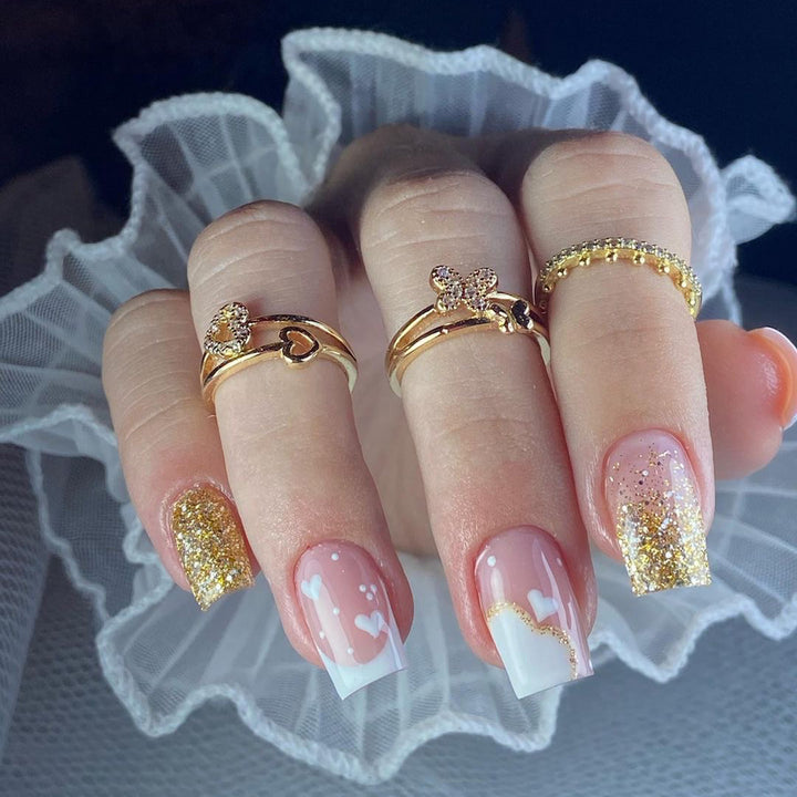 Artful nail extensions with an elegant leaf pattern Kalsten
