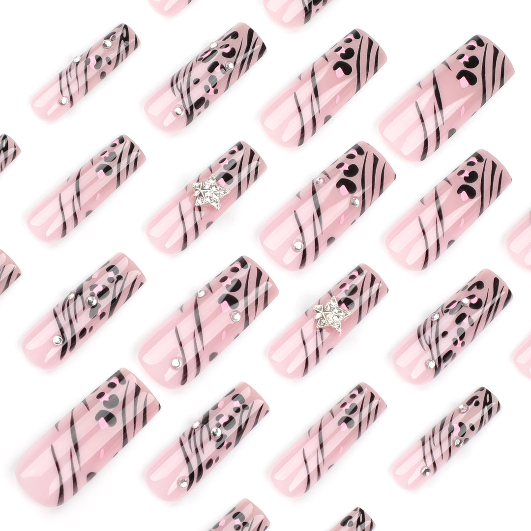 Artful Nail Art with Zebra Pattern and Glitter Accents Kalsten