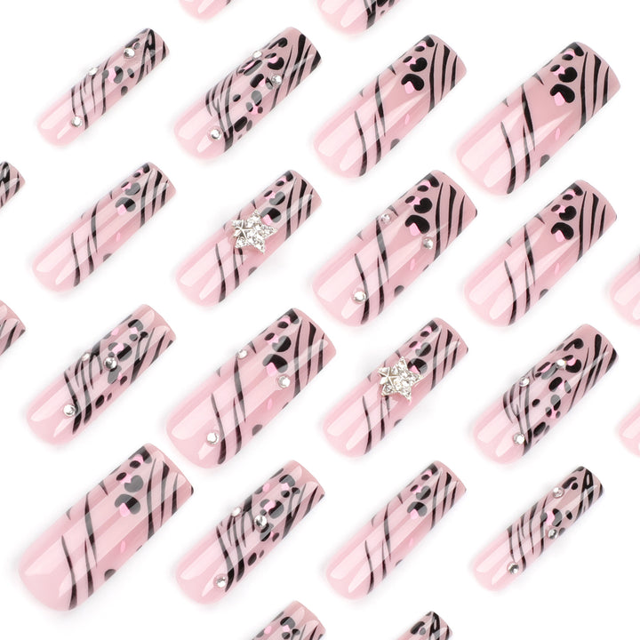 Artful Nail Art with Zebra Pattern and Glitter Accents Kalsten