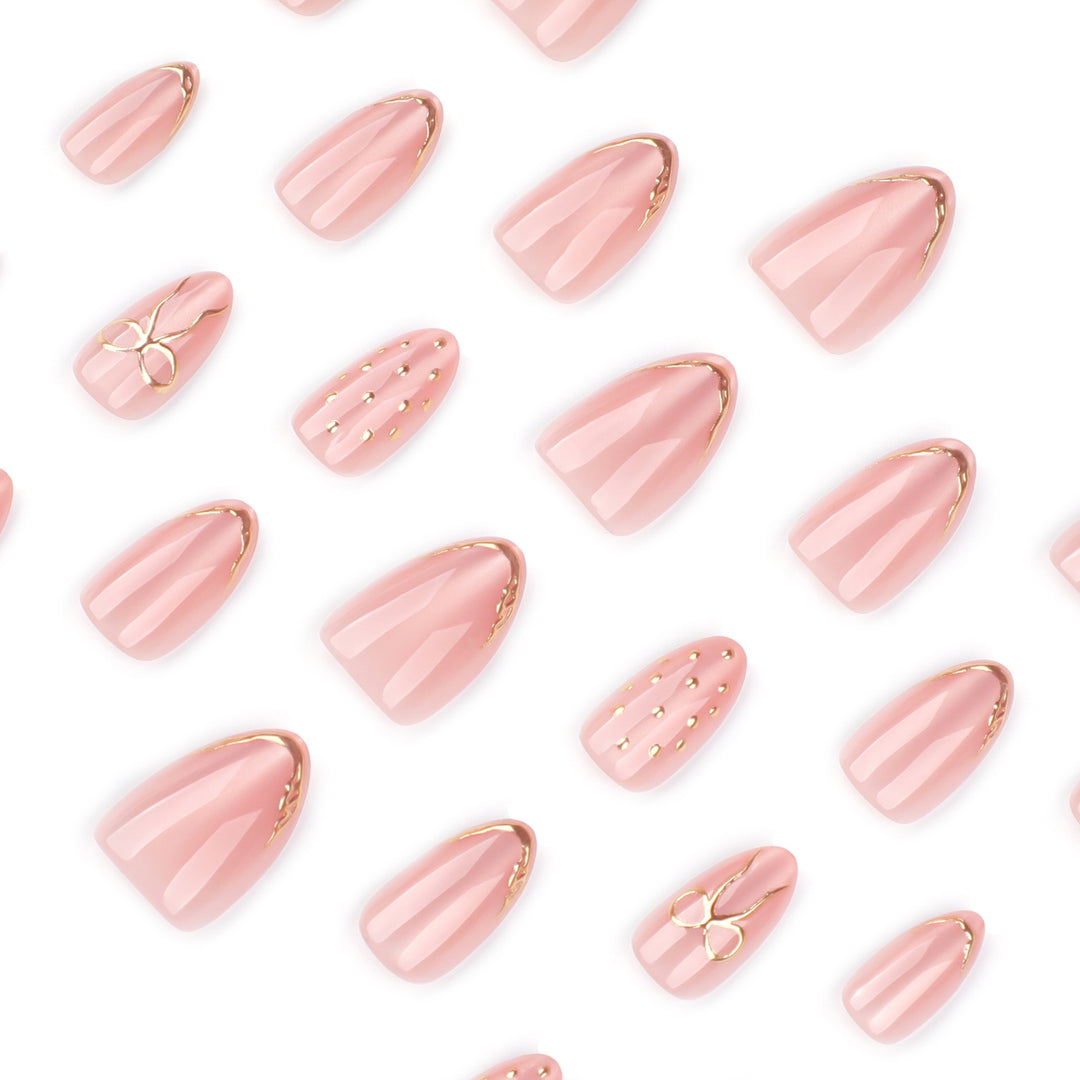 Artful nail extensions with elegant golden accents Kalsten