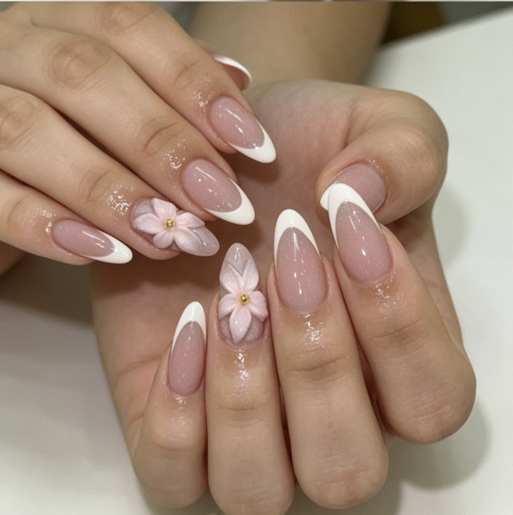 Artificial nails with floral decoration and elegant French tip design Kalsten