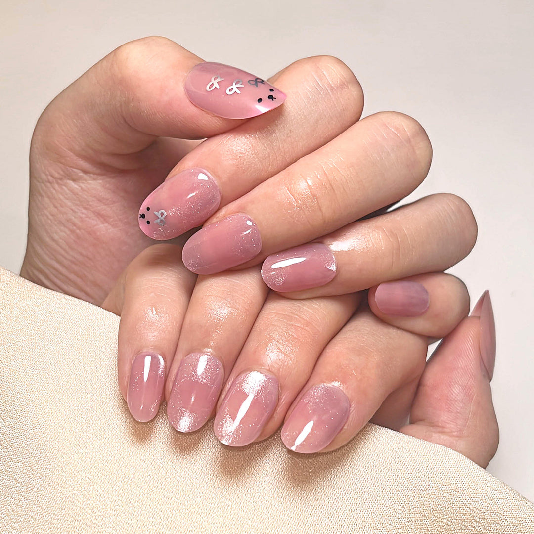Artificial nail art with playful bunny design Kalsten