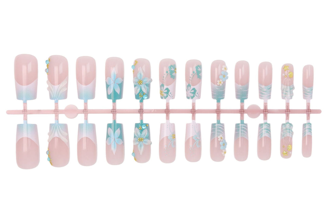 Acrylic nail set with elegant floral decorations and glitter accents Kalsten