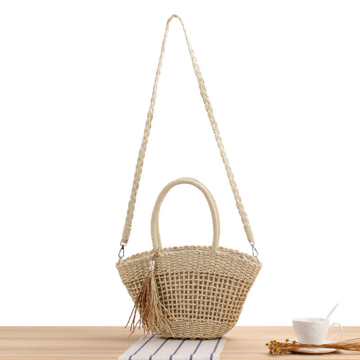 Handbag made of braided natural material with elegant tassel decoration Kalsten