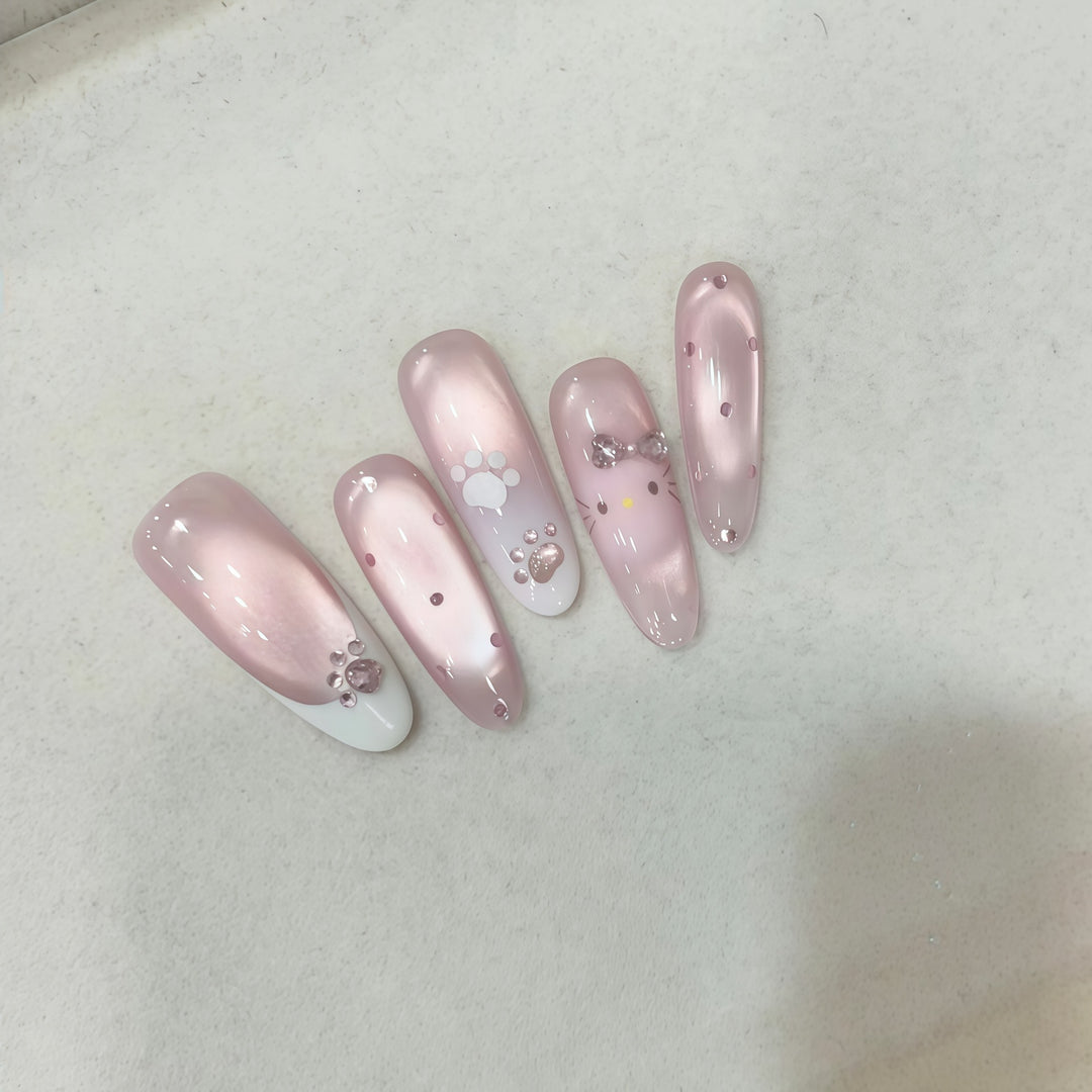 Artificial nail tips with playful penguin and paw print design Kalsten