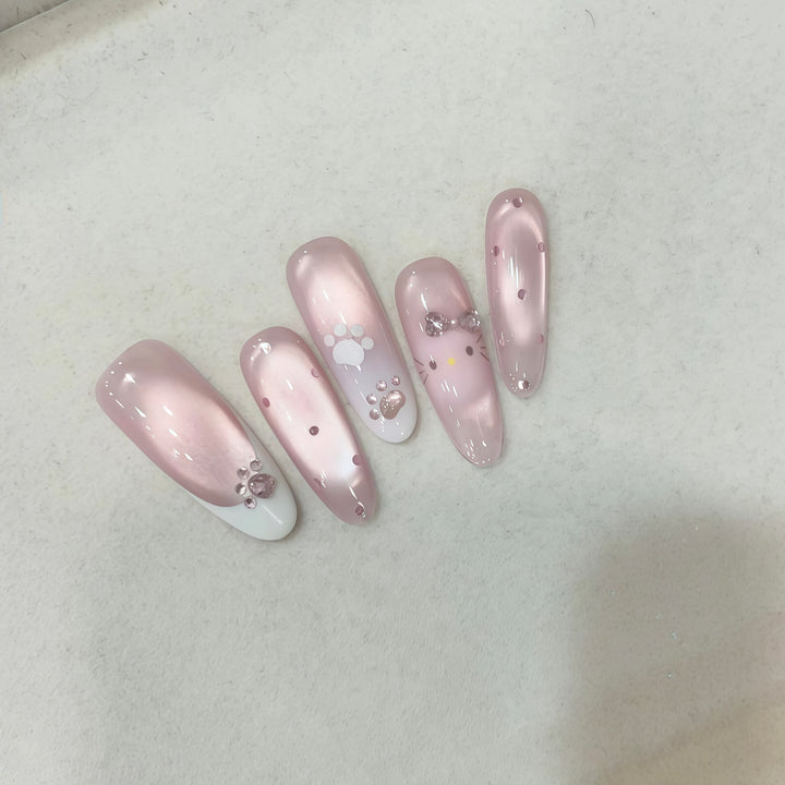 Artificial nail tips with playful penguin and paw print design Kalsten