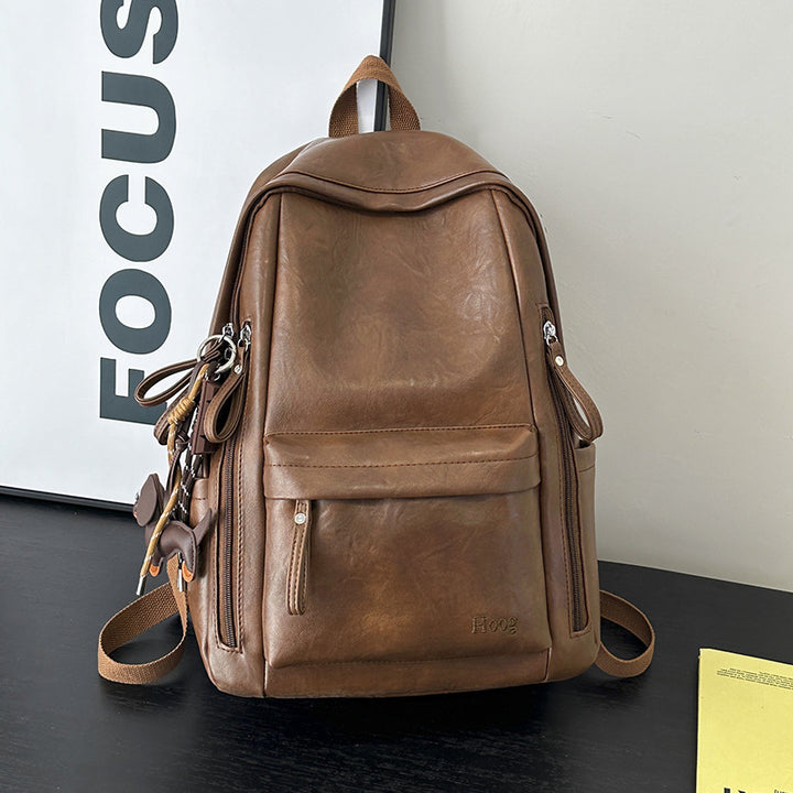 Durable Leather Backpack with Multi-Compartment Design