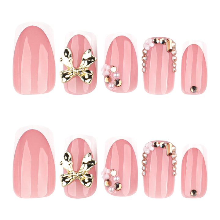 Elegant Nail Extensions with French Tips and Decorative Accents Kalsten