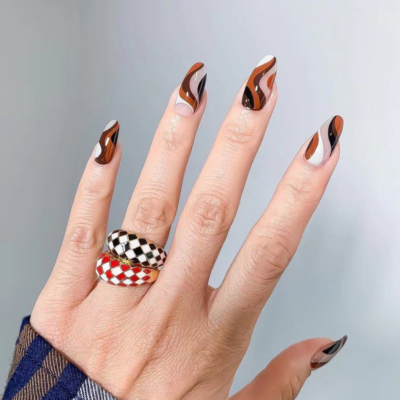Artfully decorated nail extensions Kalsten