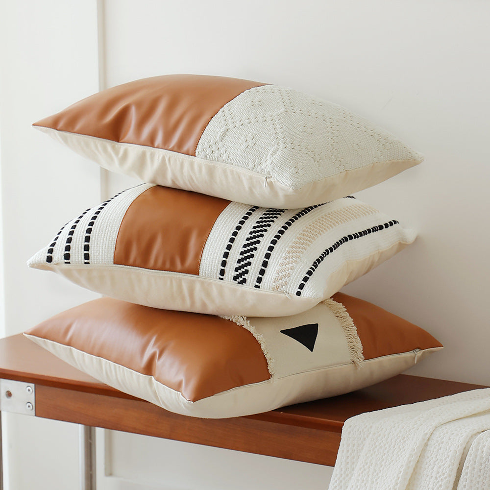 Decorative cushion cover made of faux leather with woven ethnic stripe Kalsten