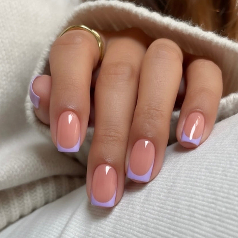 Artificial nail set with elegant French manicure style and romantic accents Kalsten