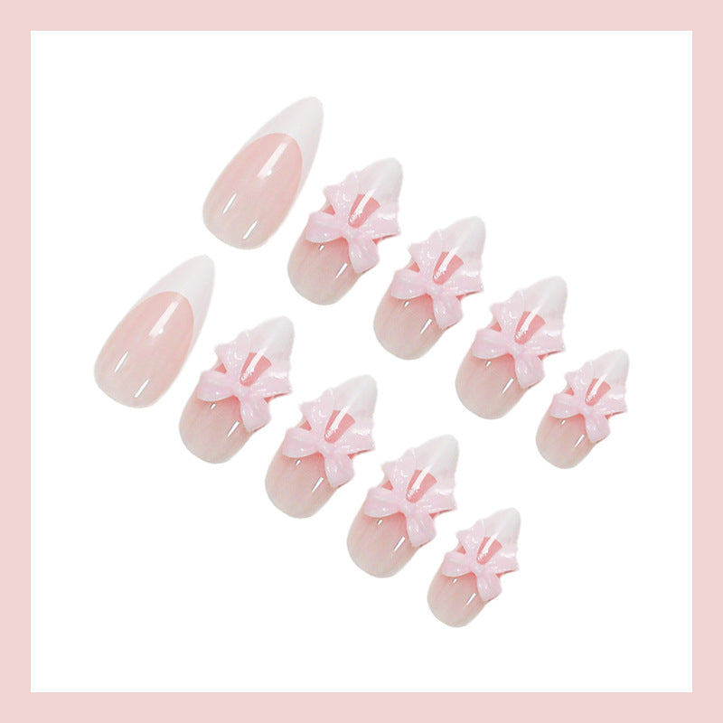 Acrylic nail set with playful bow decorations Kalsten