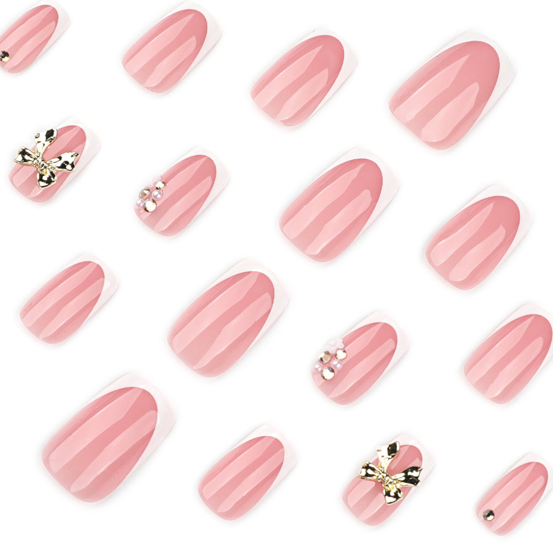 Elegant Nail Extensions with French Tips and Decorative Accents Kalsten