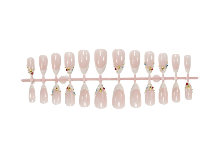 Acrylic nail set with glamorous embellishments and elegant accents Kalsten