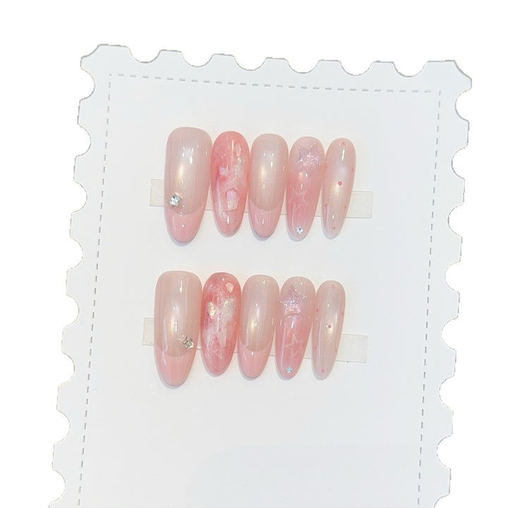 Artificial nails with delicate glitter and star motifs Kalsten