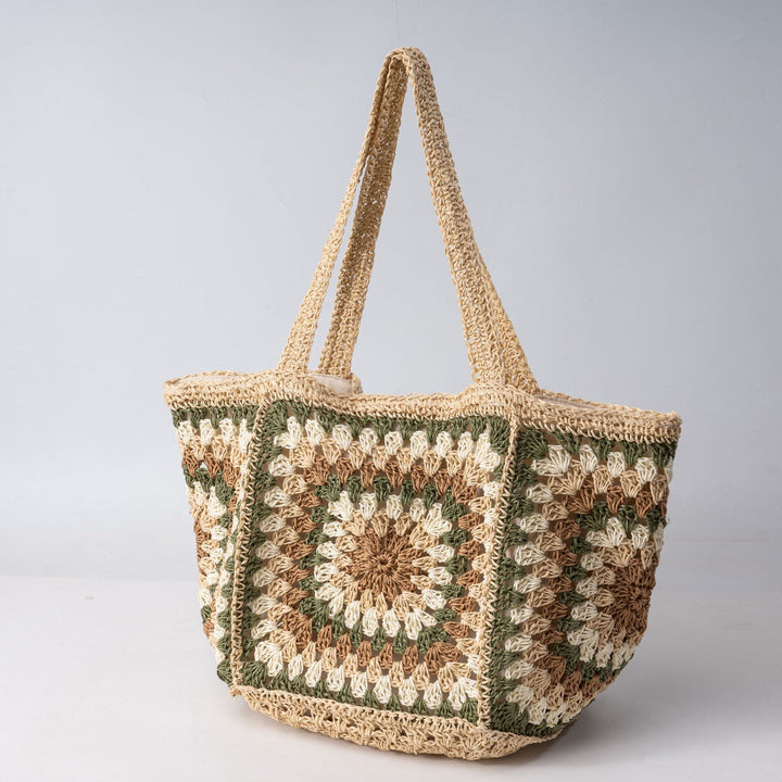 Beach bag made of hand-woven natural material with a square pattern Kalsten