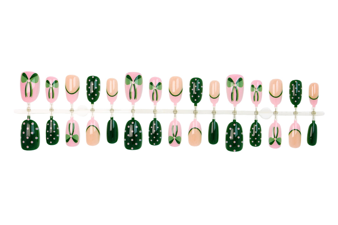 Art nail set with floral accents and playful designs Kalsten